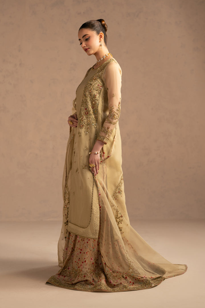 Back angled view showing movement of organza layer and structured panels, formal event ready attire.
