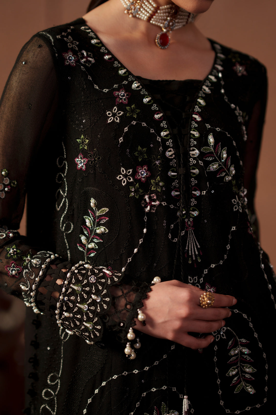 Close-up of Zeya black embroidered khadi net shirt highlighting sequin embroidery, detailed craftsmanship and elegant neckline design
