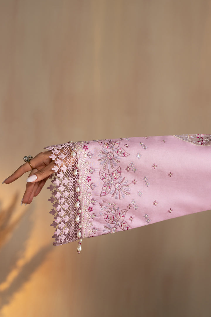 Sleeve close up showing embroidered cuff border and lace finishing of Shayleigh suit, detailed summer ready to wear outfit.