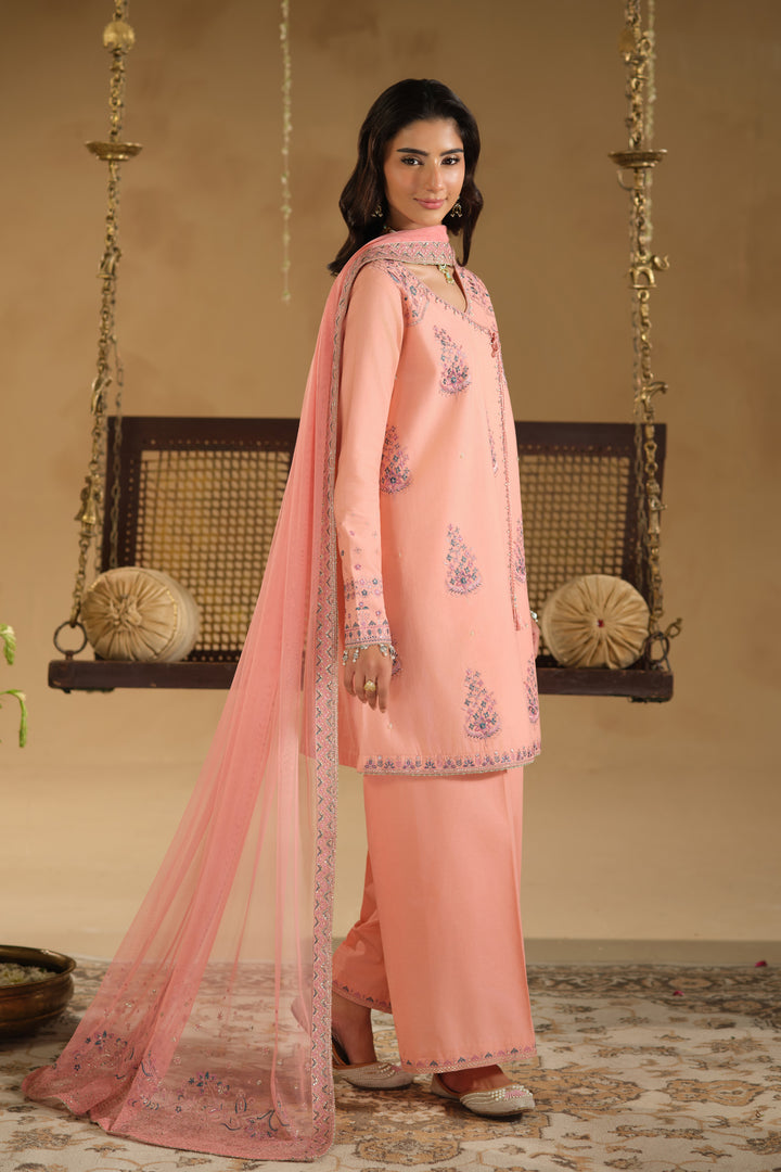 Side angle of Umaiza ready to wear outfit with flowing net dupatta and embroidered sleeve borders