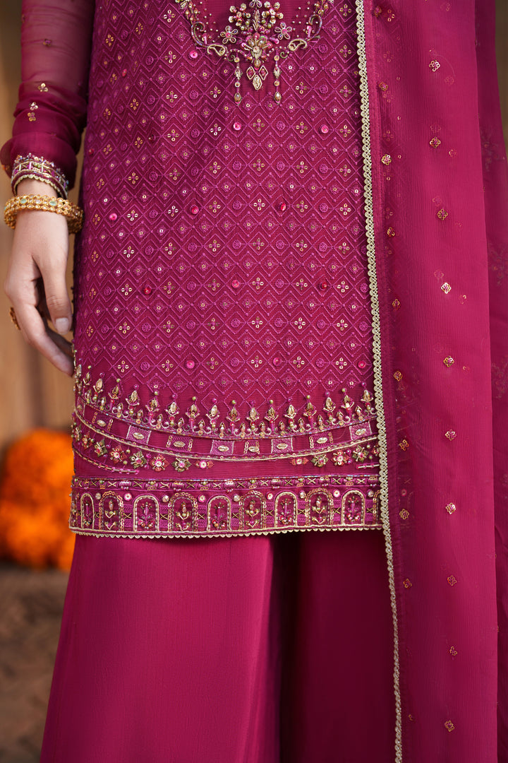 Purple embroidered traditional outfit with gold details