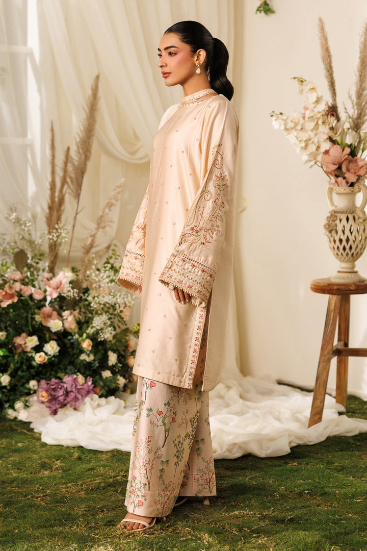 Side standing view of NAQSHI Rayla outfit highlighting easy silhouette and smooth cotton satin fabric