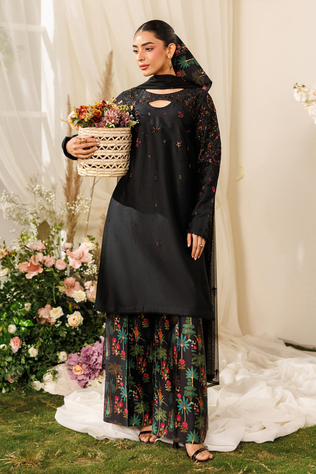 Side angle of NAQSHI Halia outfit highlighting printed culotte trousers and smooth cotton satin fabric