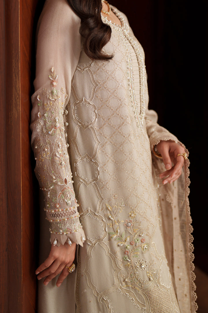 Detailed sleeve view of Minera embroidered khadi net shirt featuring intricate embroidery, cutwork finishing and decorative handcrafted details