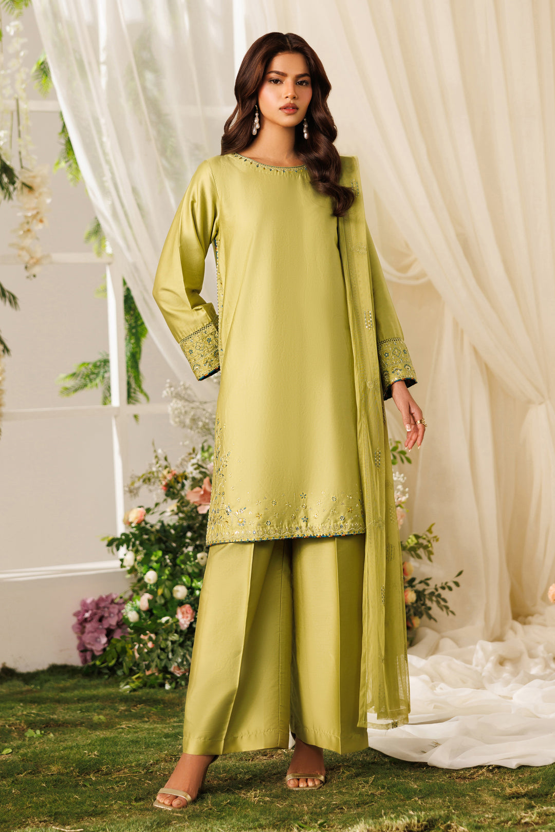 Side standing view of NAQSHI Qiana outfit showing printed culottes and smooth cotton satin fabric