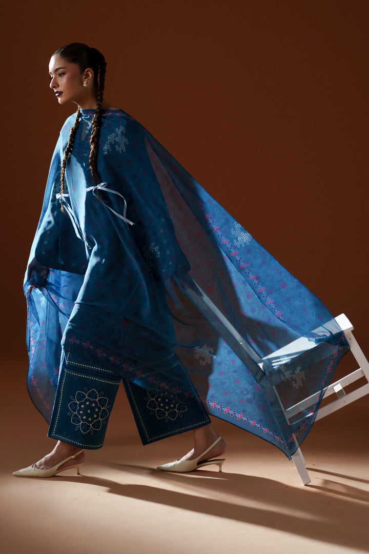 Juni teal casual pret outfit with flowing printed crinkle chiffon dupatta, embroidered lawn shirt, and cambric culotte trouser.
