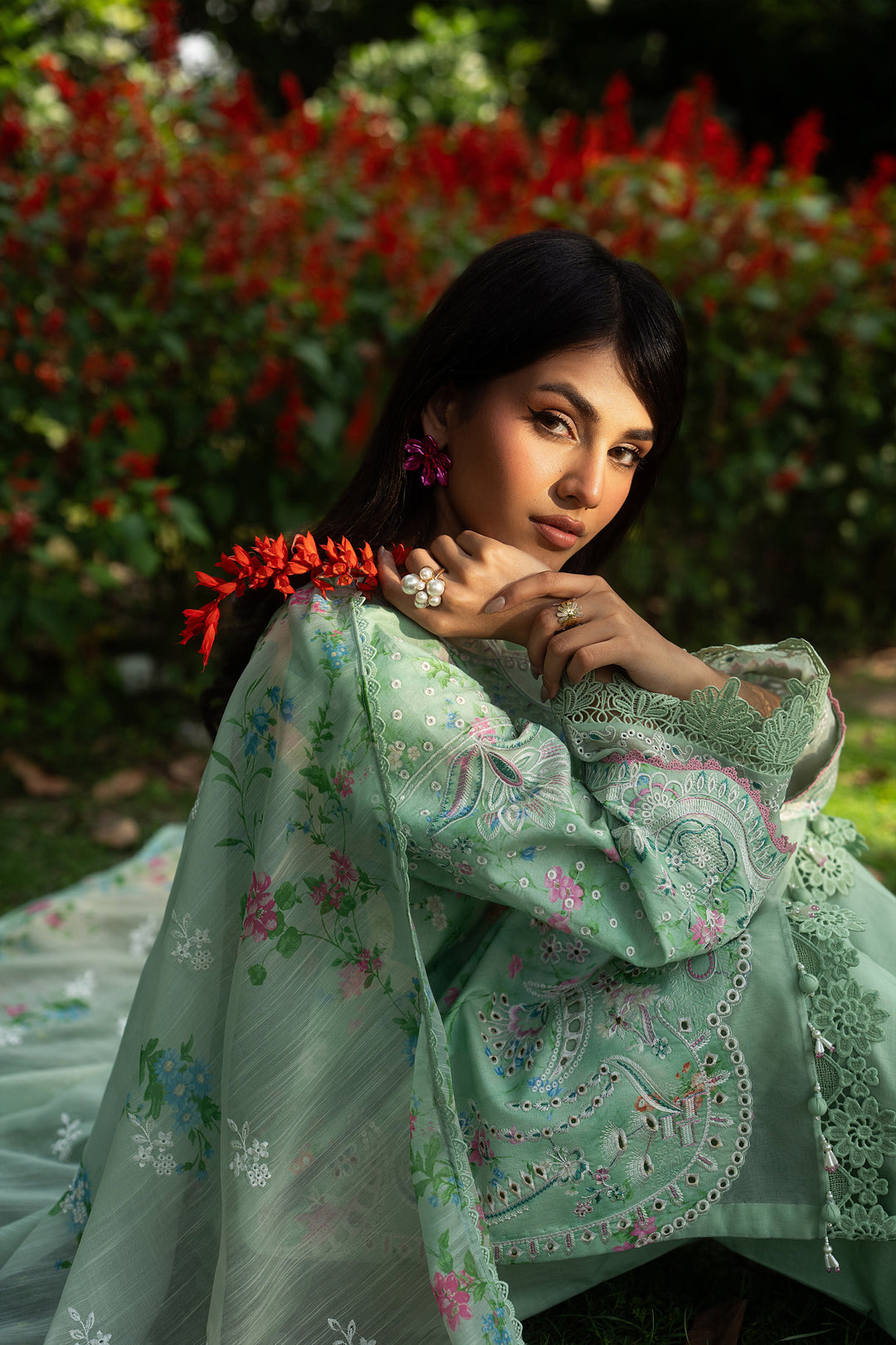 Side close look of Menesa aqua green outfit highlighting detailed embroidery, organza sleeve patches and lace finishing