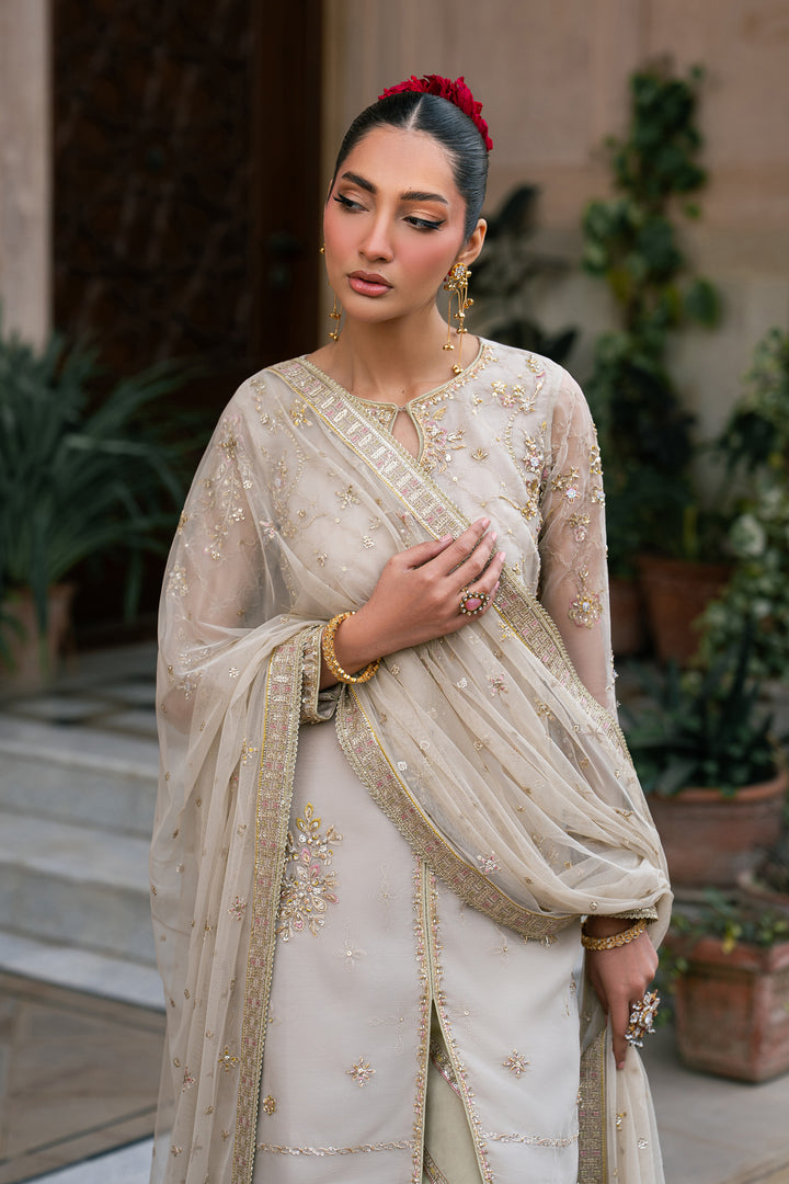Saaz semi formal dress with embroidered organza shirt, pistachio flared trousers and elegant net dupatta