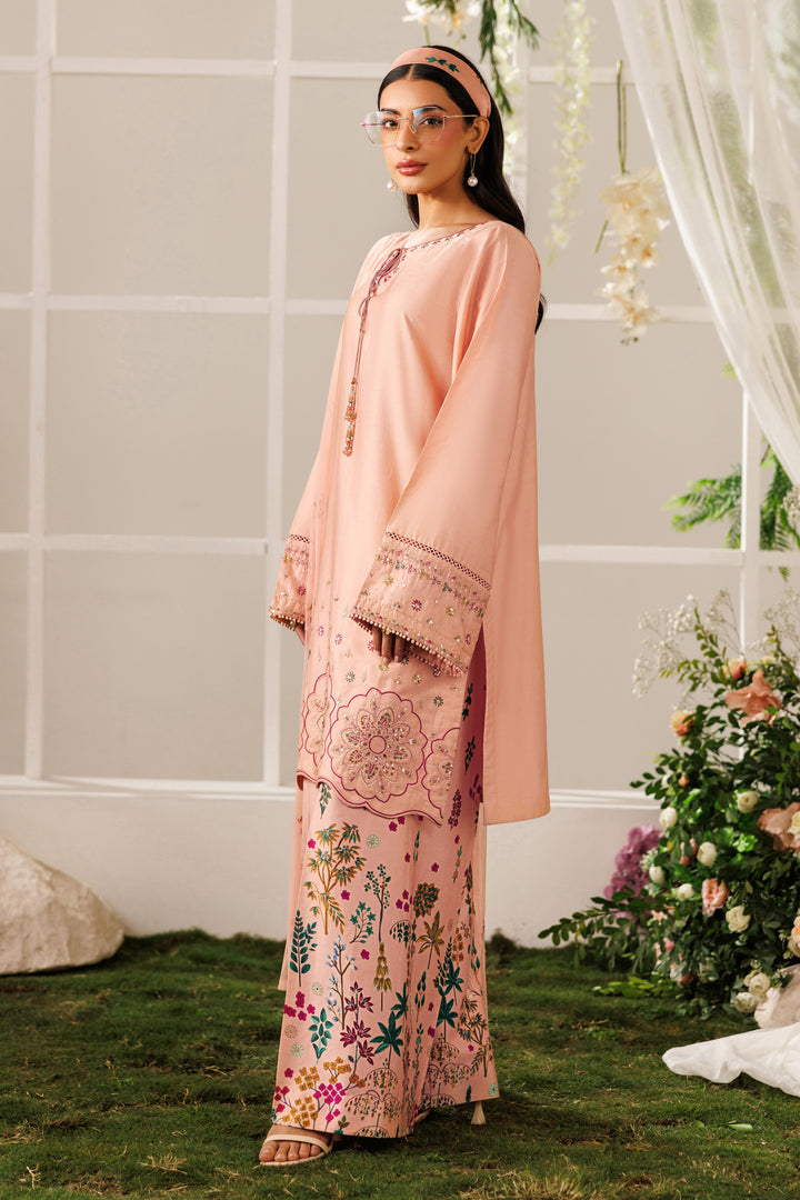 Side standing view of NAQSHI Hoorish outfit highlighting printed culottes and smooth cotton satin fabric