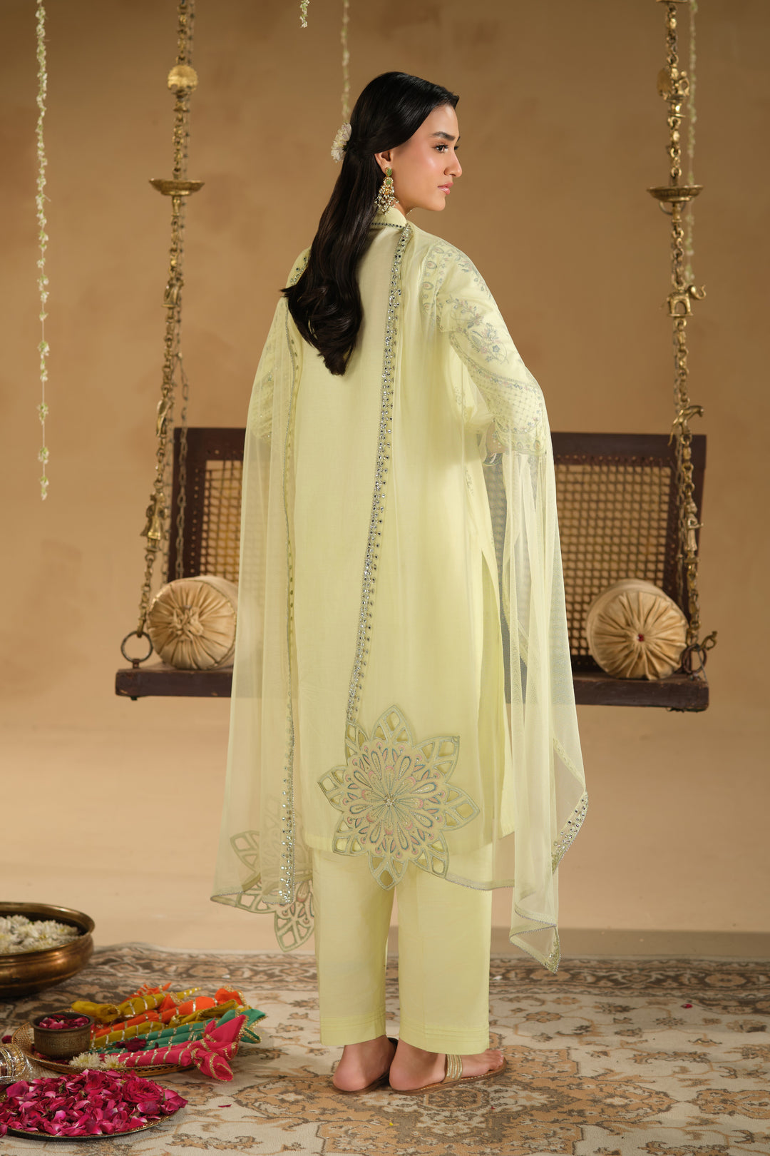 Back view of Nagma 3 piece outfit featuring long shirt fall and net dupatta with delicate border detailing