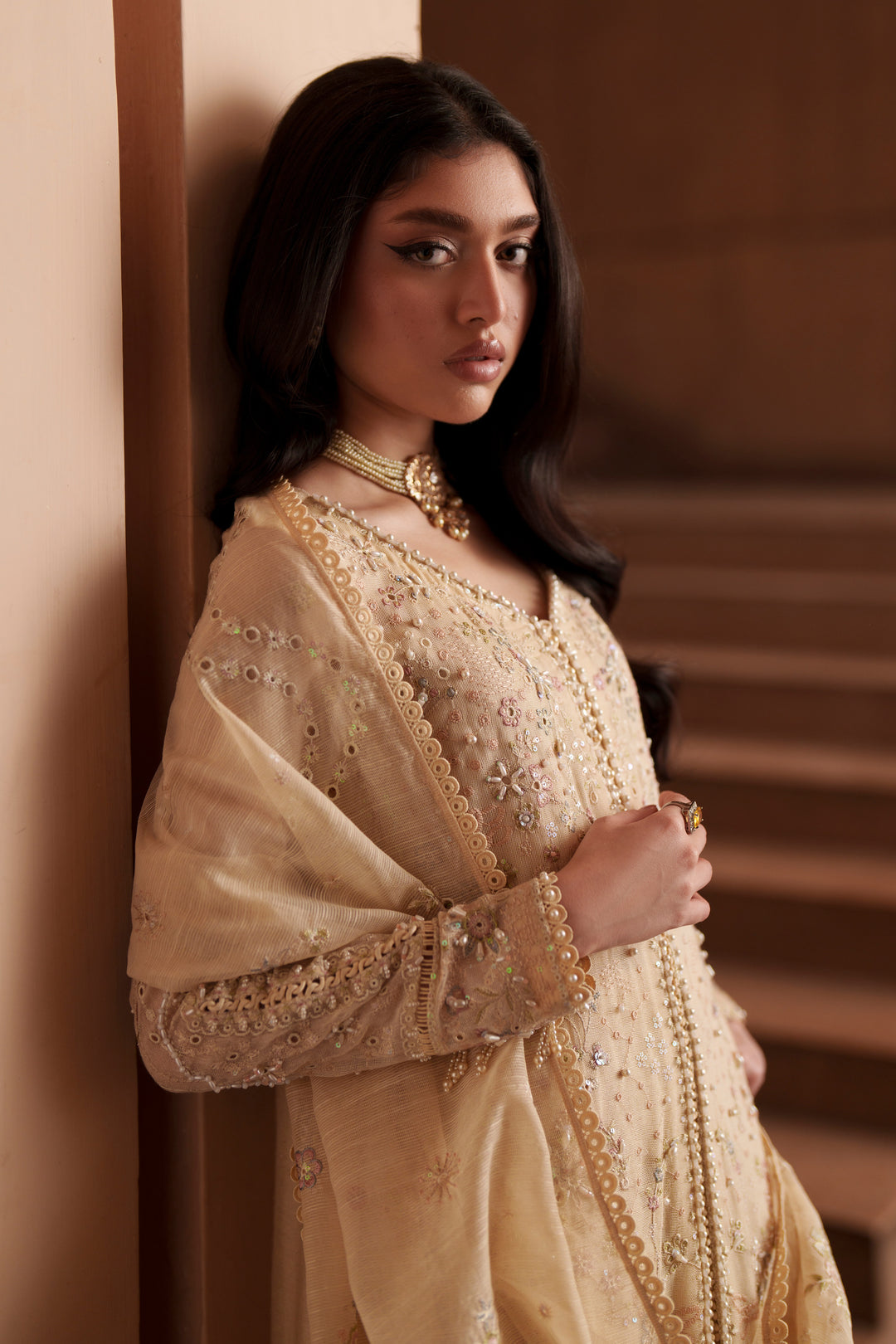 Portrait styling shot of Igor vintage cream formal outfit featuring delicate embroidery, cotton organza dupatta and elegant evening wear fashion