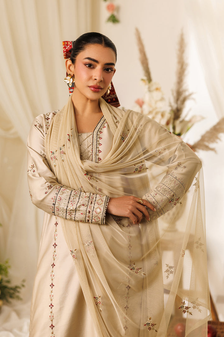 Close-up of NAQSHI Numa shirt showing embroidered neckline, sleeve borders, and neat cotton satin finish