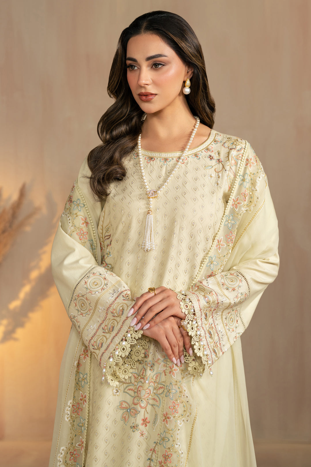 Portrait styling view showing front embroidery placement and balanced silhouette of Nerissa light olive 3 piece ready to wear suit.