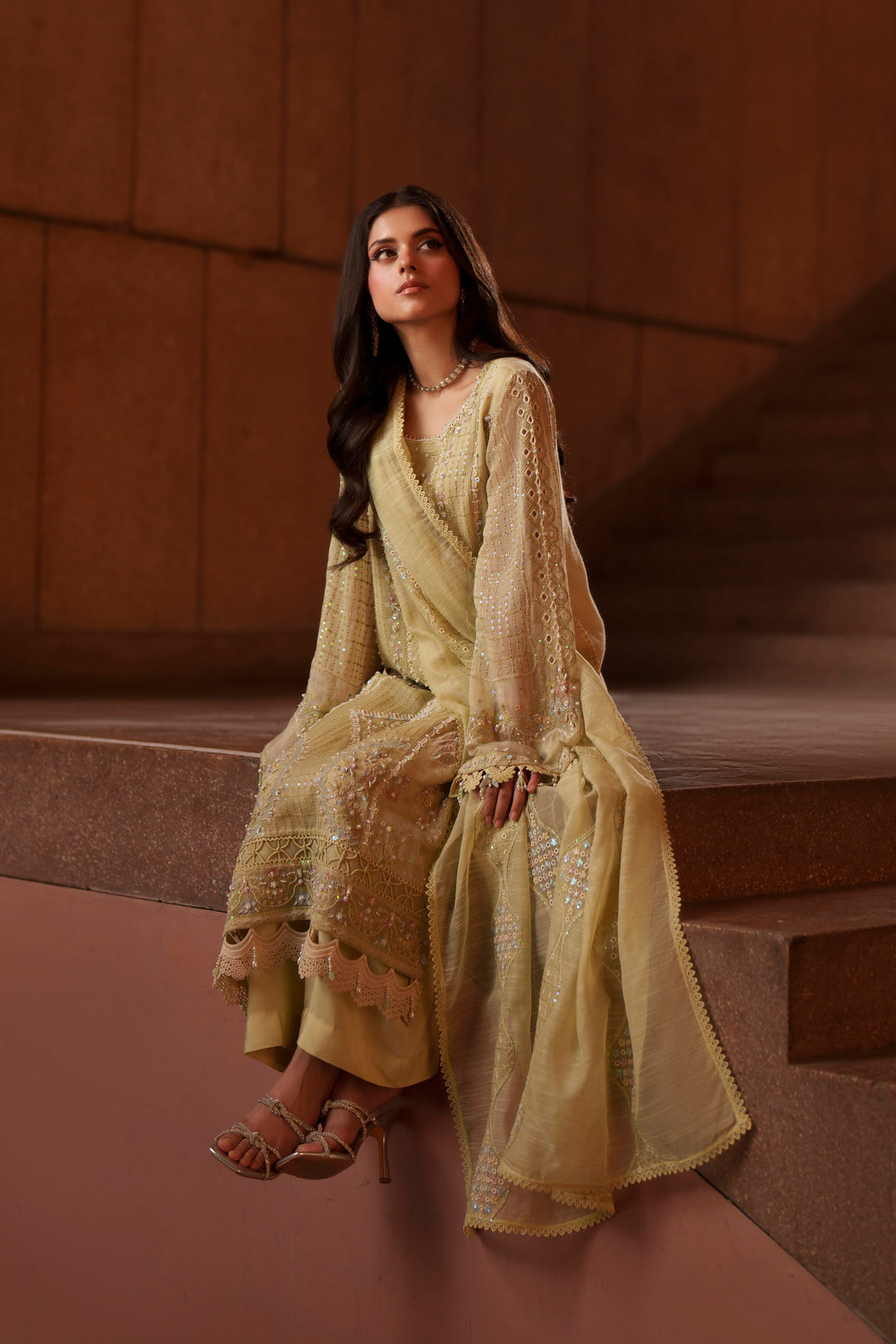 Full-length view of Luzia light lime embroidered khadi net dress with PK raw silk culottes, cotton organza dupatta and elegant formal wear styling