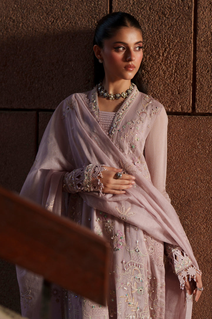 Portrait view of NAQSHI Anahi lilac formal outfit featuring embroidered neckline, soft embellishments and graceful luxury pret styling