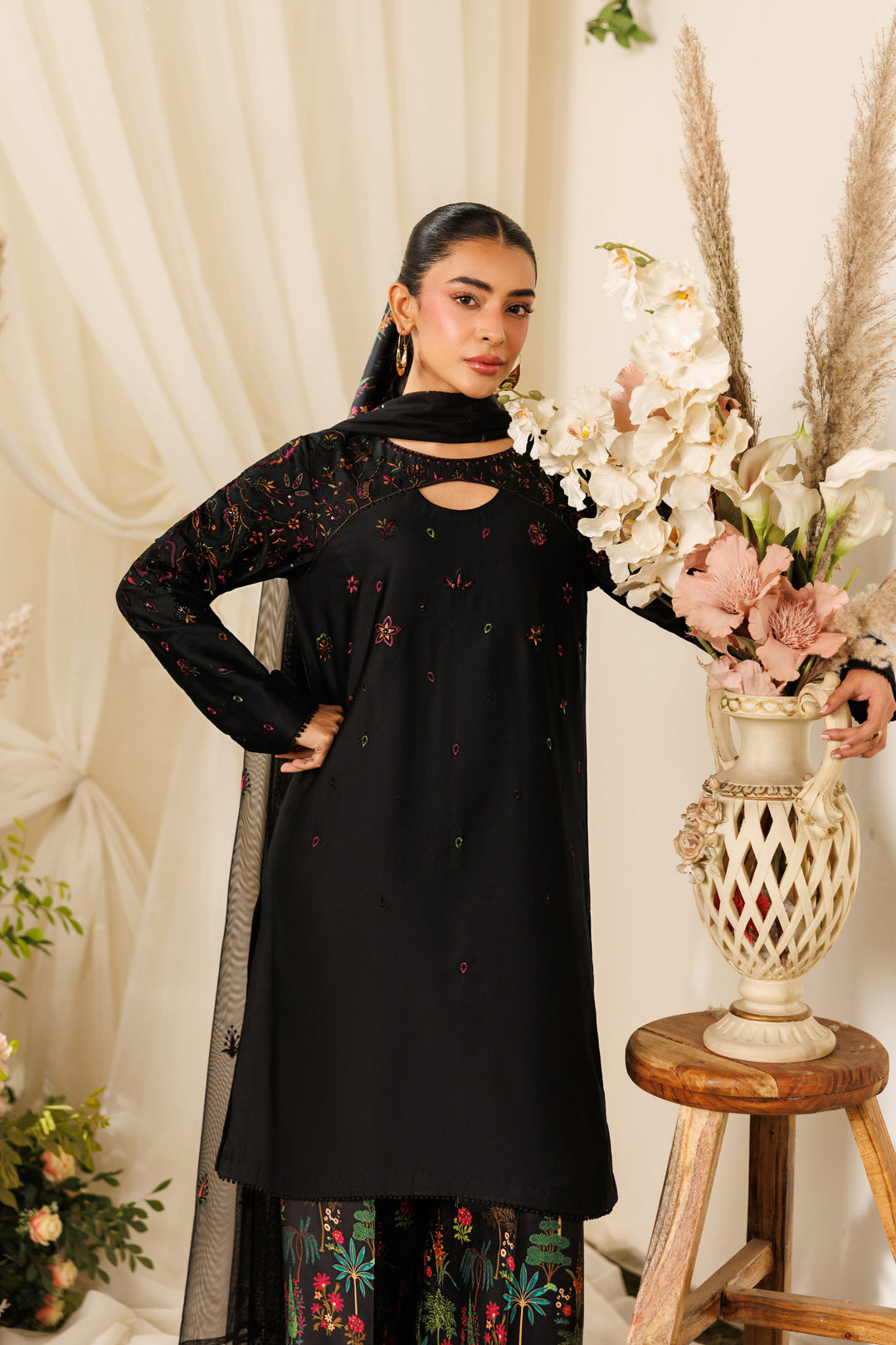 Front pose of NAQSHI Halia outfit showing sleeve embroidery detail and balanced ready-to-wear finish