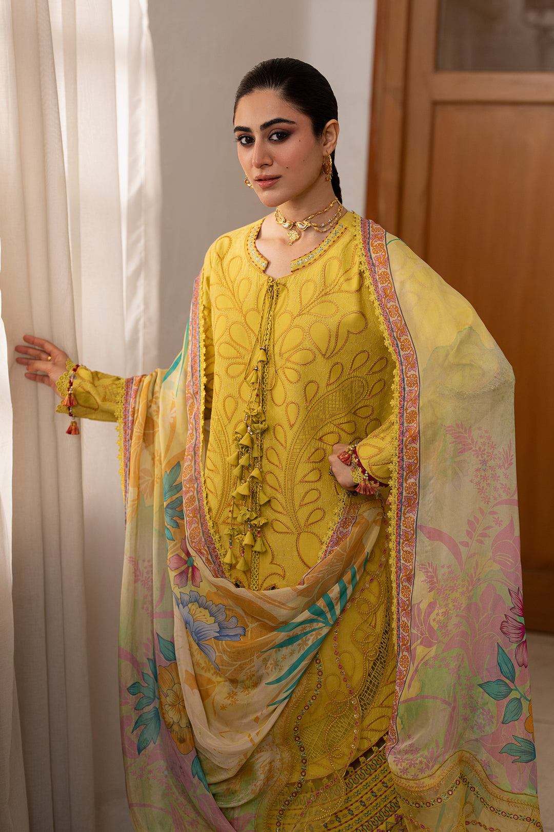 NAQSHI Seraya lemon 3-piece embroidered lawn suit featuring decorative hem detailing, flairy culottes and tissue silk digital print dupatta