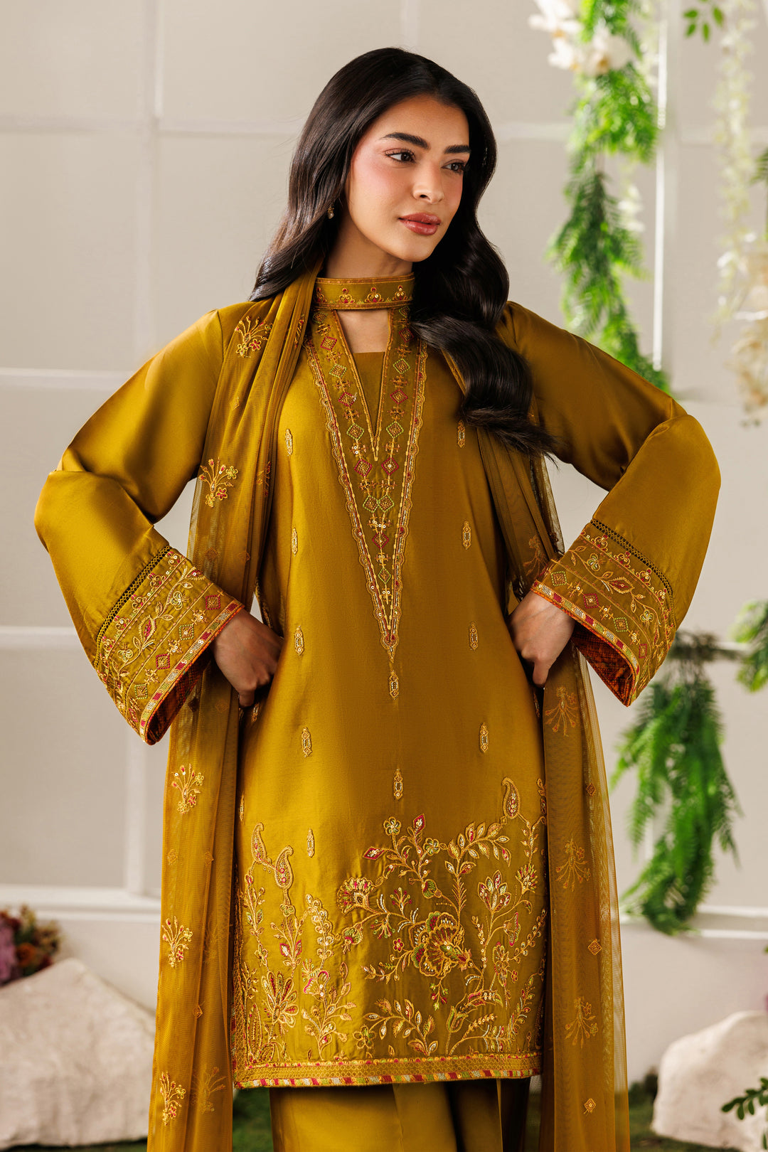Front close-up view of NAQSHI Eda outfit showing embroidered neckline, sleeve borders, and smooth cotton satin finish