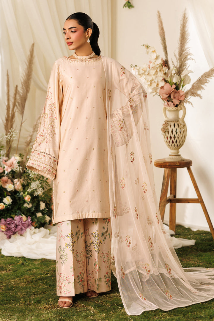 Full-length back angle of NAQSHI Rayla outfit showing flowing net dupatta and printed culotte trousers