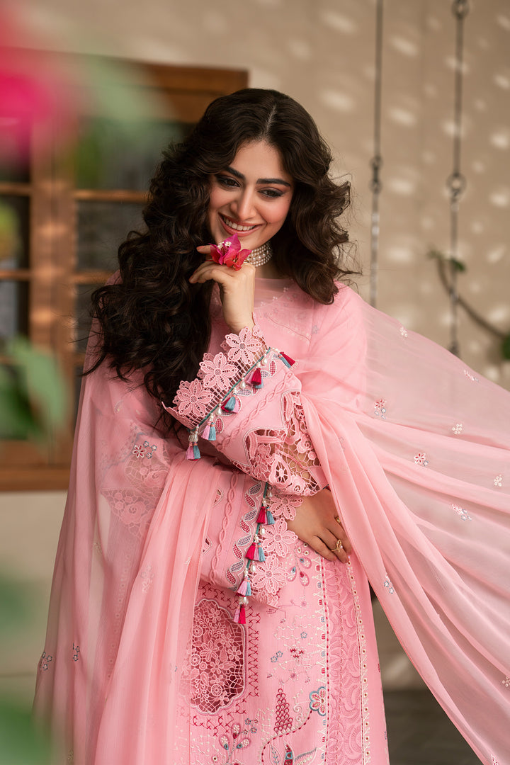 Close-up portrait of Kashmeera pink embroidered lawn dress featuring embroidered front motifs and coordinated crinkle dupatta styling