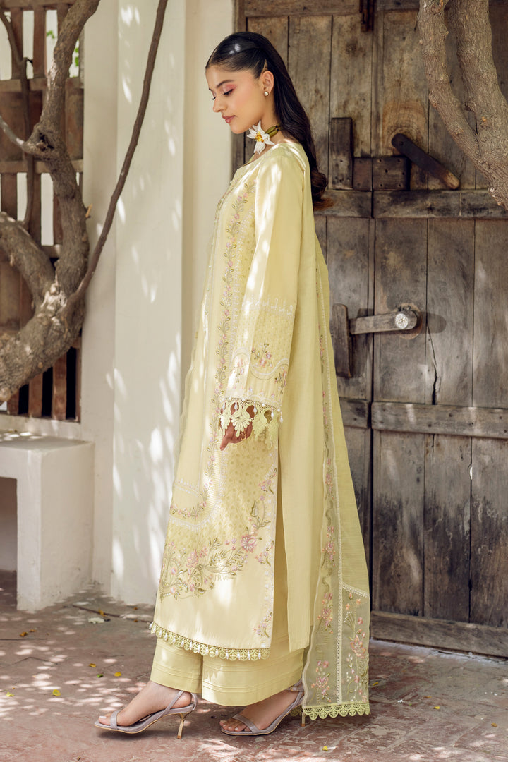 Side view of NAQSHI Gulshan showing loose full sleeves with all‑over head embroidery, heavy lace edge &amp; delicate hanging embellishments for movement

