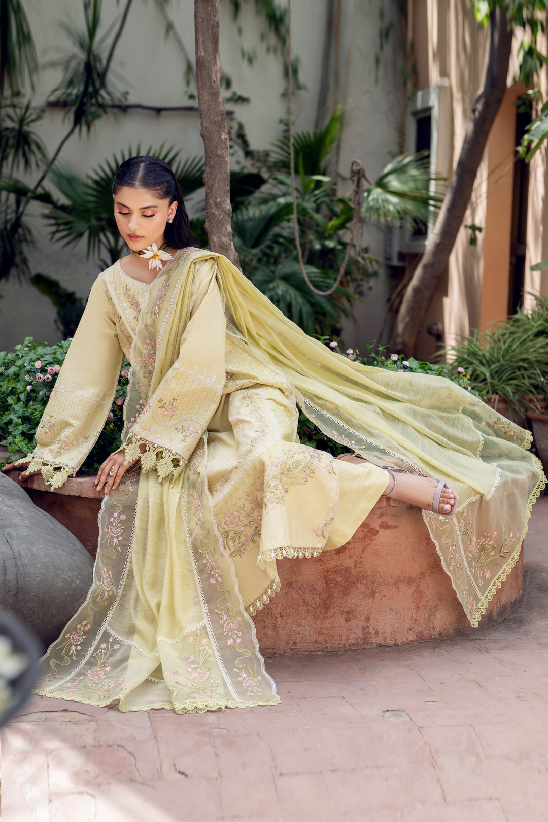 Model wearing full NAQSHI Gulshan 3PC: lime‑lemon Pima lawn shirt with embroidered neckline, loose embroidered sleeves, lace‑trim hem, culottes &amp; organza dupatta