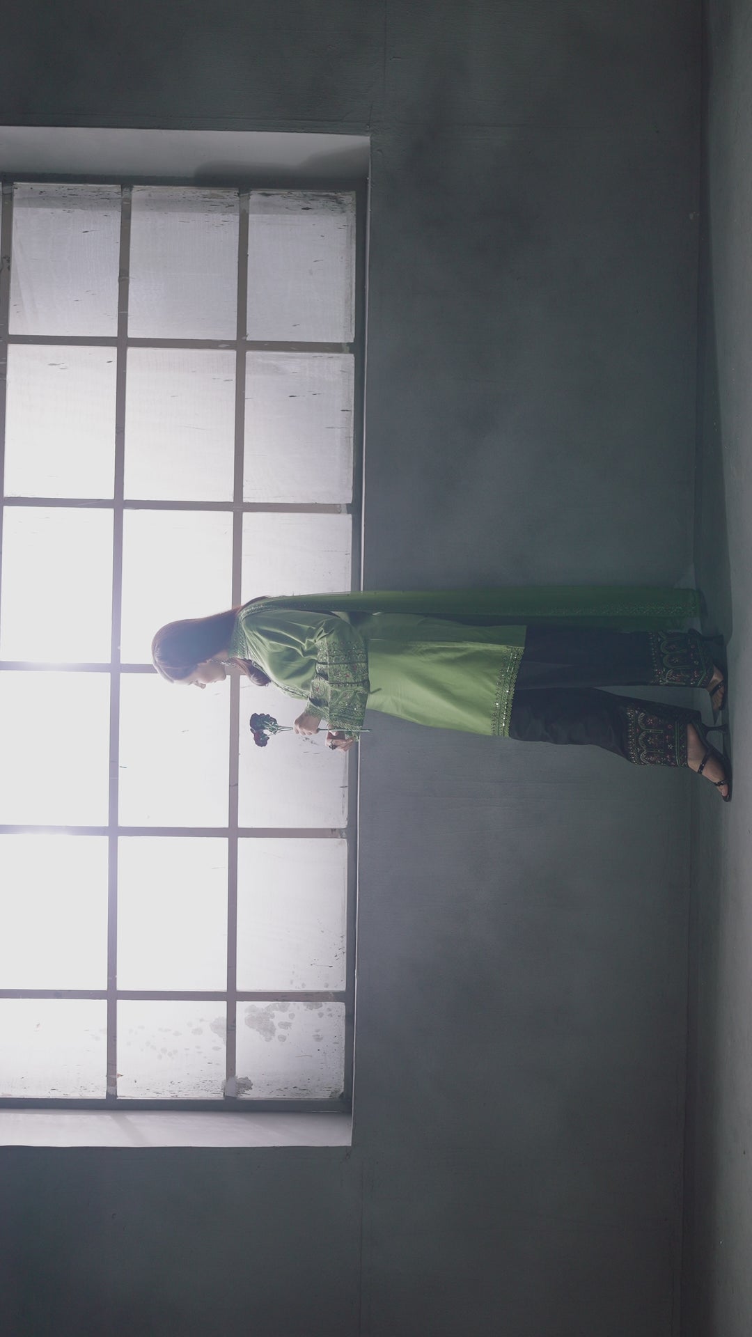 Video thumbnail of NAQSHI Abeera lime green formal set showing movement of net dupatta and embroidery details ideal for occasion outfits.