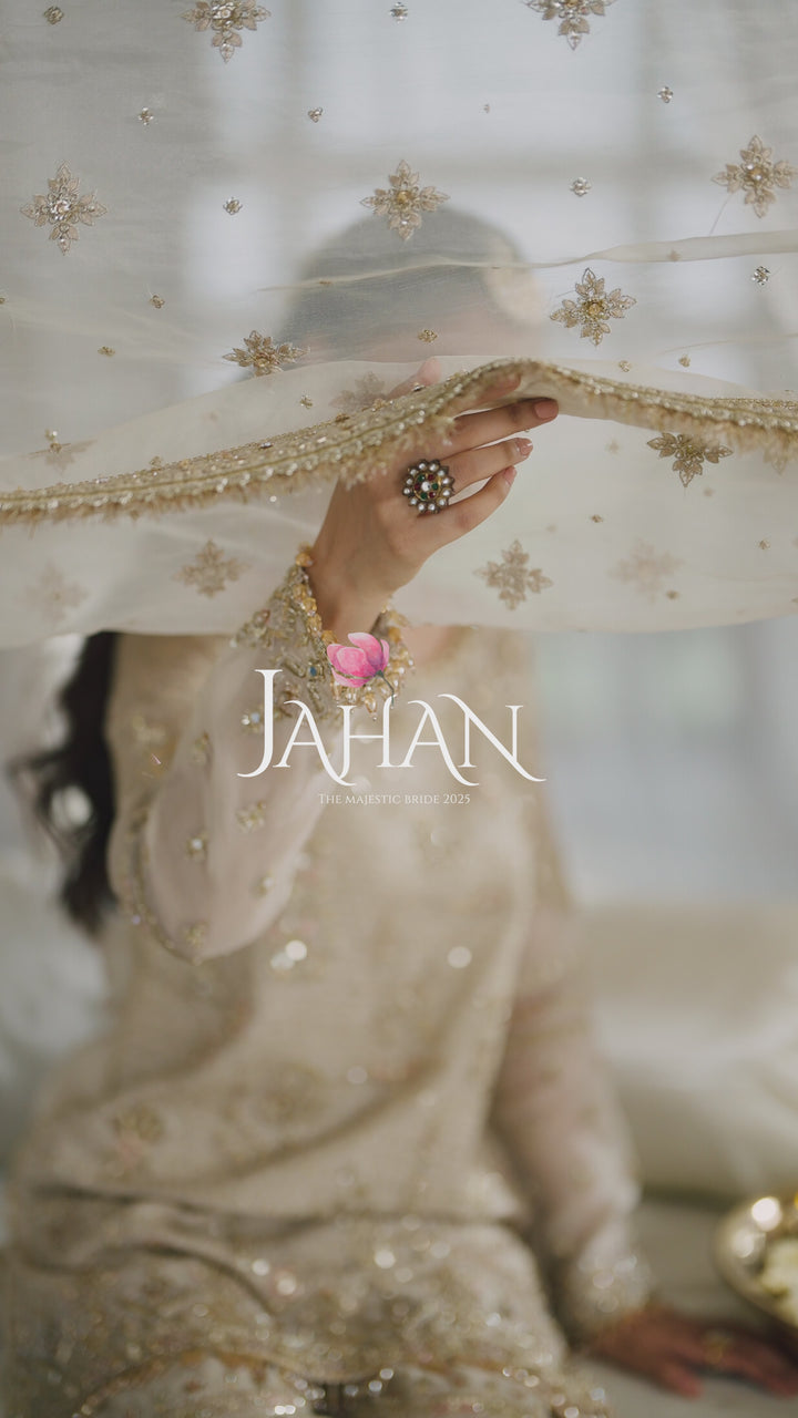 Video thumbnail of NAQSHI Aneeqa ivory beige embroidered formal dress highlighting movement and design of dupatta for special occasion wear.