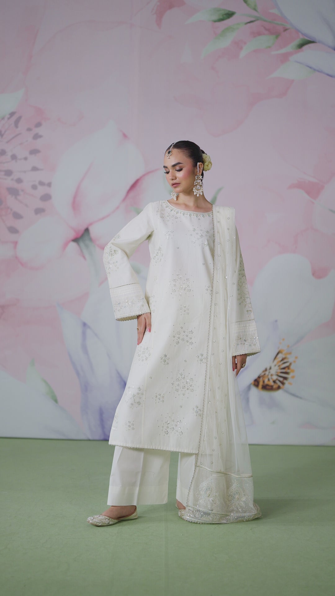 Full length view of Preeti off white 3 piece outfit showing balanced straight shirt cut with culotte trousers