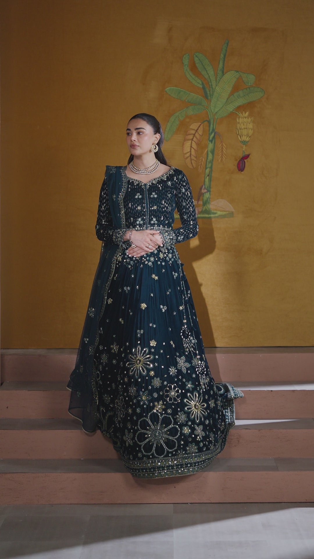 Tall vertical shot of NAQSHI Narmeen zinc velvet embroidered lehenga set showing full silhouette with flare and dupatta — ready-to-wear special occasion dress