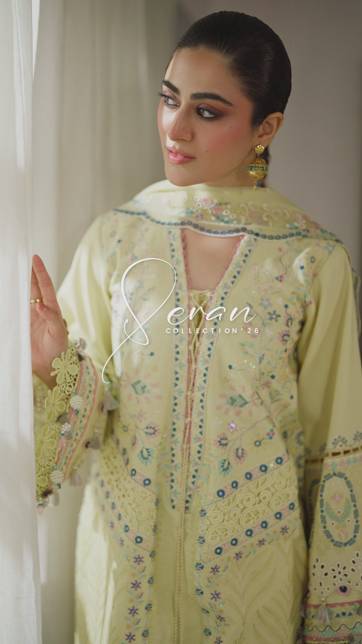 NAQSHI Nashiman light yellow embroidered lawn outfit video featuring flowing crinkle dupatta, embroidered panels and elegant summer casual wear