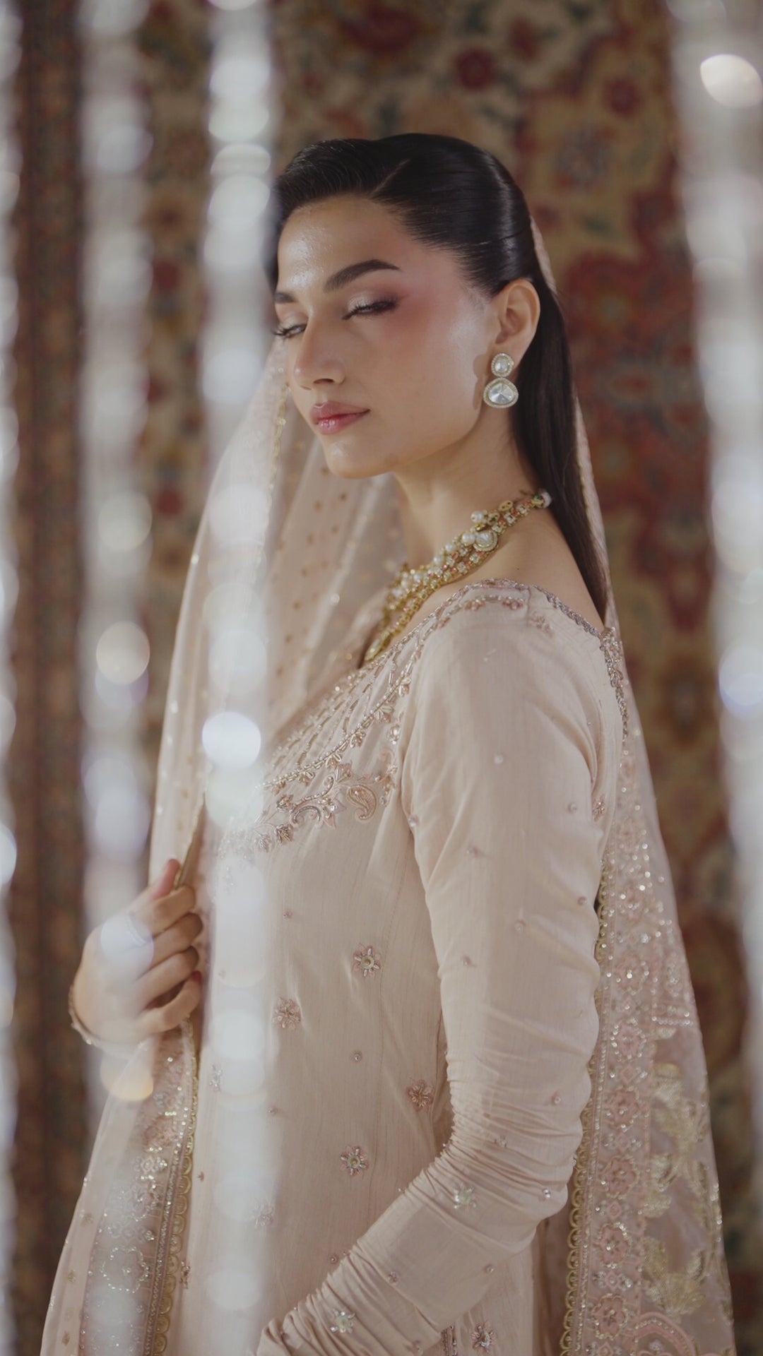 Soft profile portrait of Mahbeer pale pink 4-piece Nikkah outfit with light dupatta styling, calm and modest ready made wedding outfit.