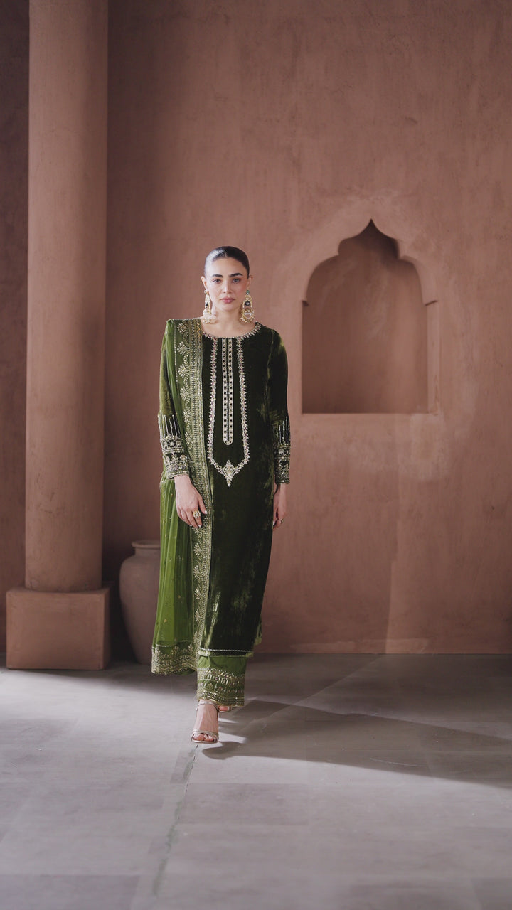 Video preview of NAQSHI dark green formal ready-to-wear outfit showing complete event-ready look and graceful movement